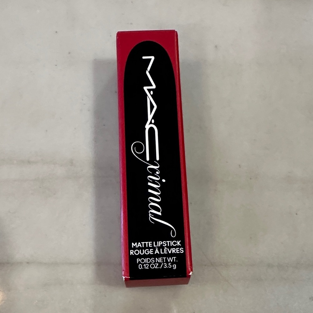 MAC Matte Lipstick in Bold Red color is ruby woo